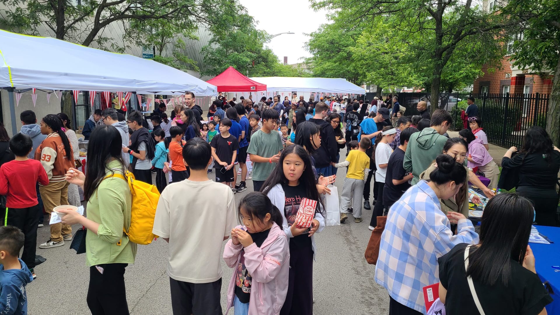 Crowd gather at the 2026 CASL Family Block Party